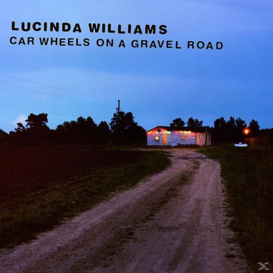 Car Wheels On A Gravel Road image 0