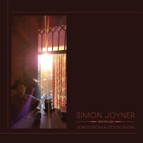 Songs From A Stolen Guitar image 0