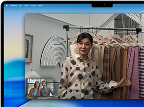 A video call on a MacBook Pro where a woman shows fabrics to two people on the call, with Center Stage keeping her centered in the frame as she moves around